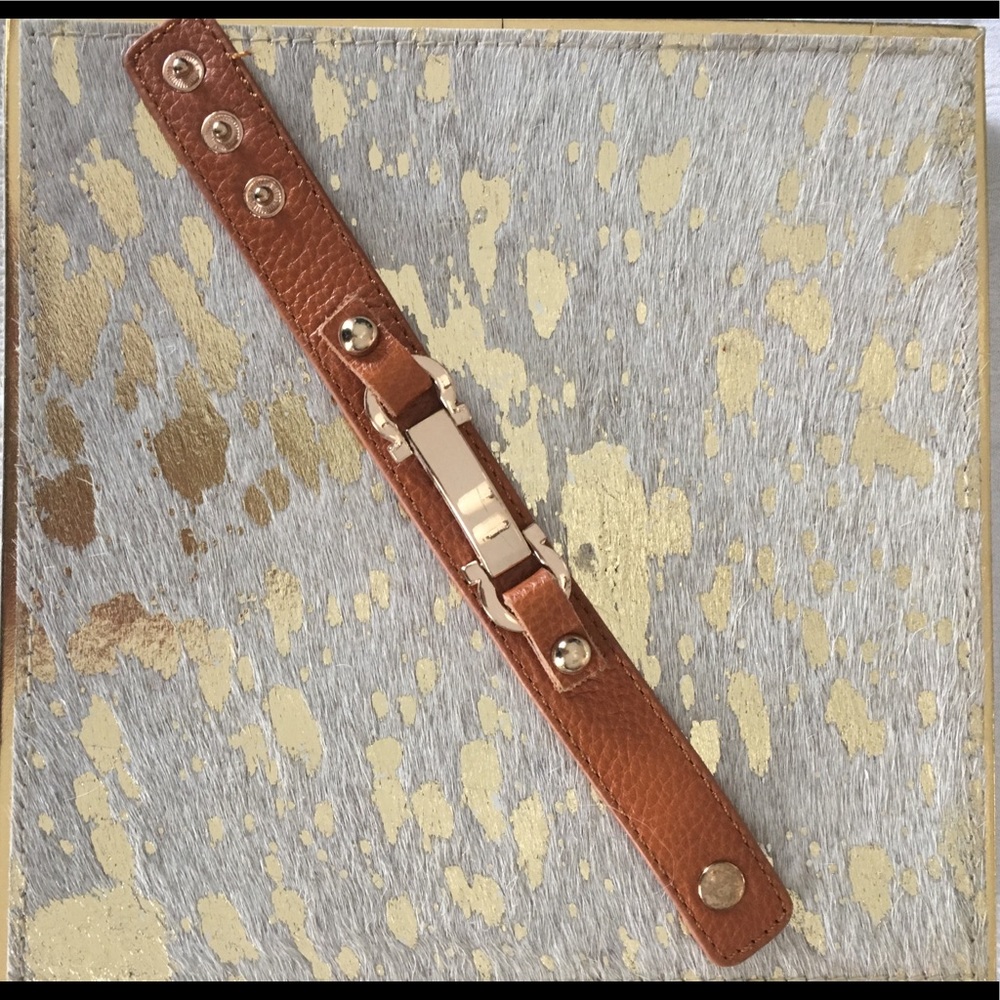 Leather and gold tone cuff bracelet